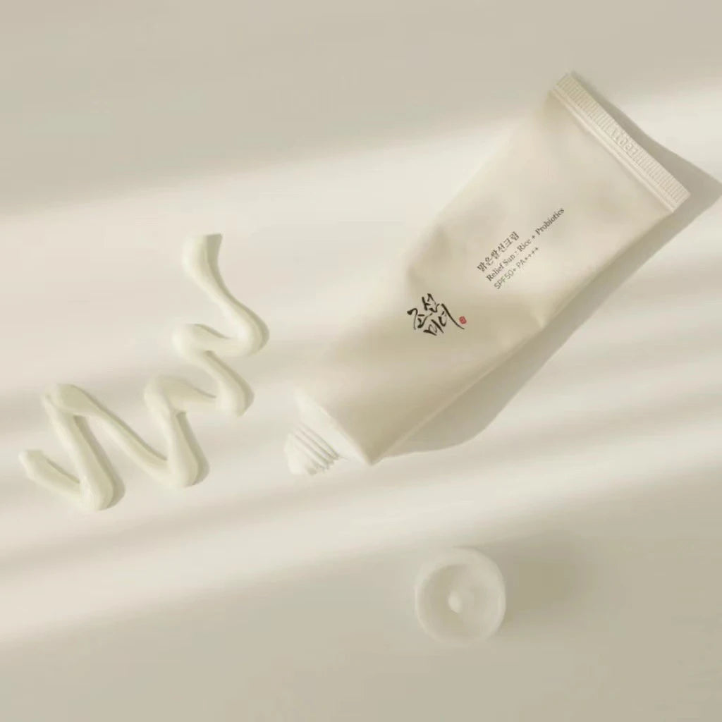 Texture crème solaire SPF50 légère sans voile blanc
